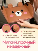 Гамак-подставка для ног с медвежонком в руках, ткань и швы крупным планом